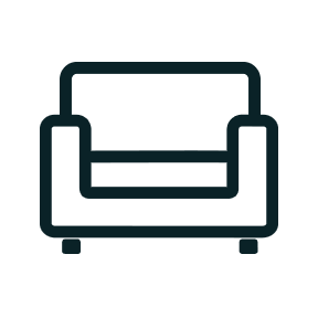 An icon depicting a large comfy chair